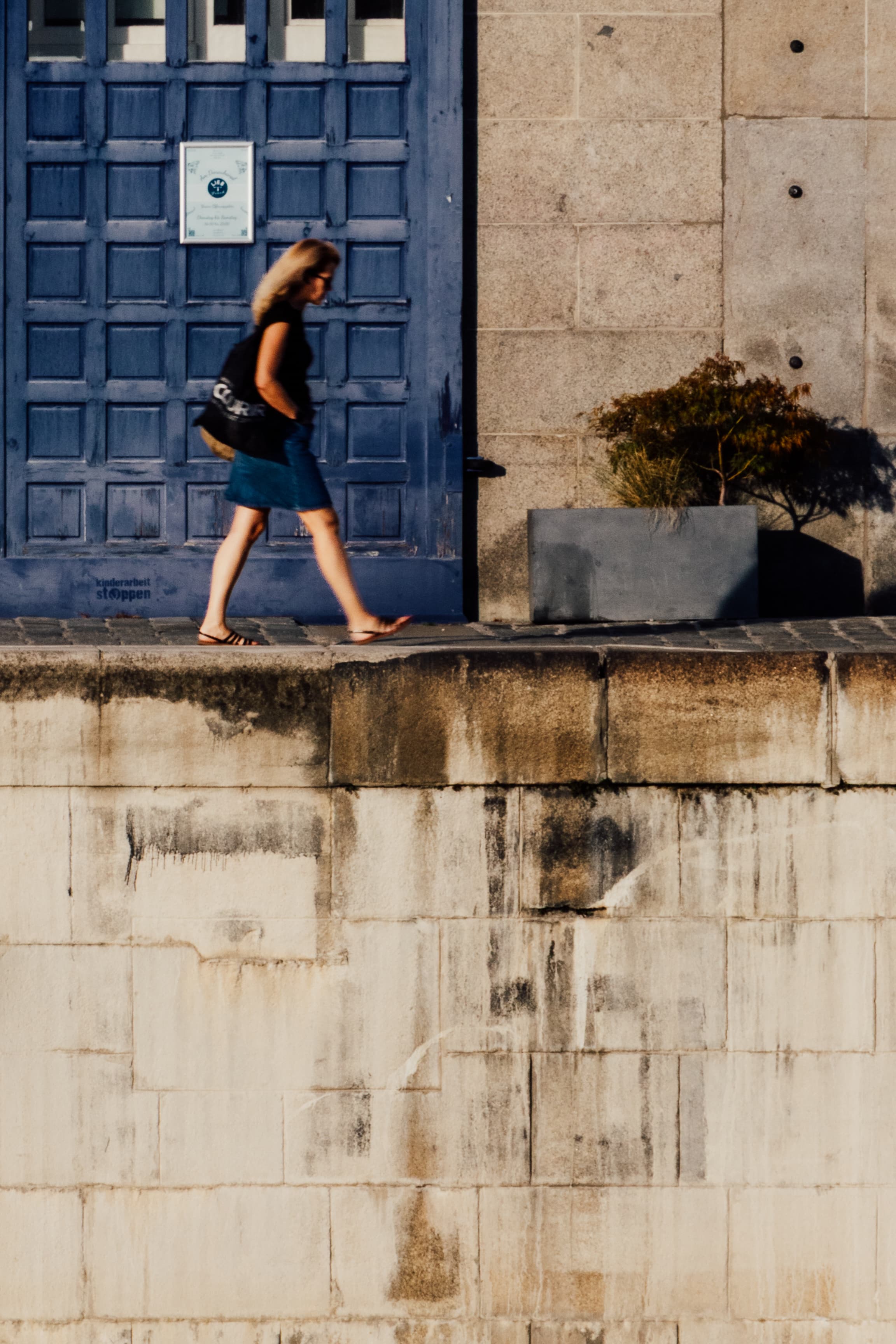 WomanBlueDoor_01_dnjpqd